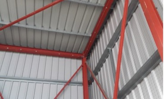 Bird netting sides of warehouse